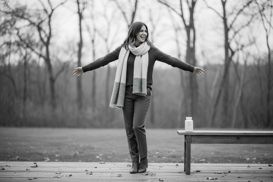 Woman outdoors during fall happy with NuGeneLabs Mood Elevate supplement on the bench - Supplements for Hormonal Balance