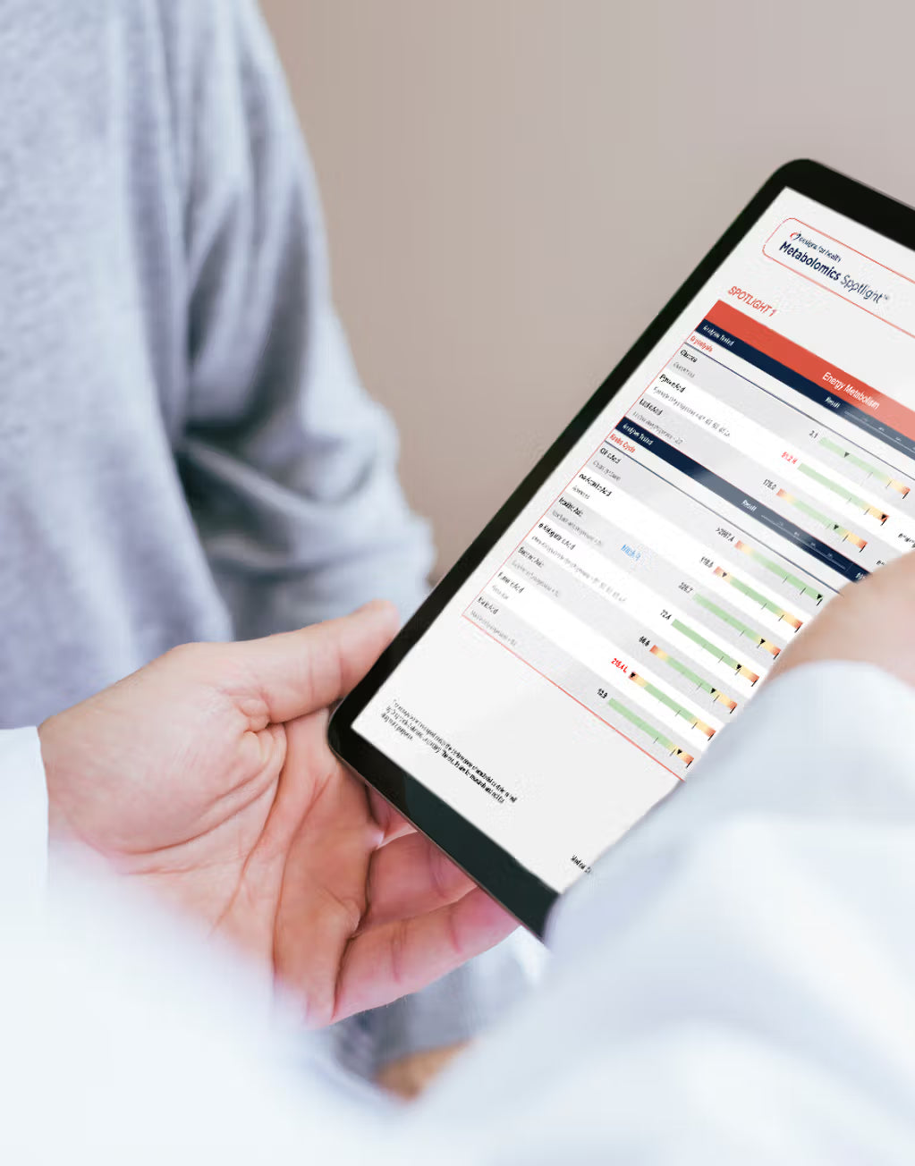 Practitioner explains GI Spotlight test results to a patient